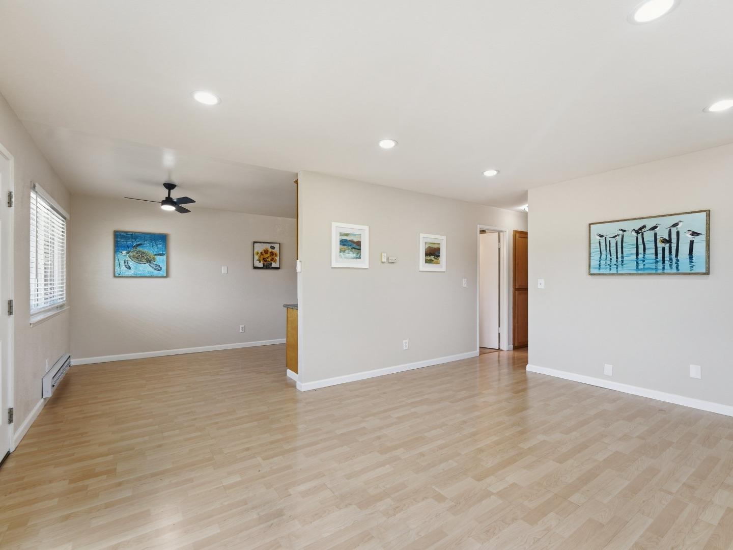 607 Valley Forge Way, Unit 4 Campbell, CA 95117 - Photo 6 of 12 wooden floor in an empty room with a window