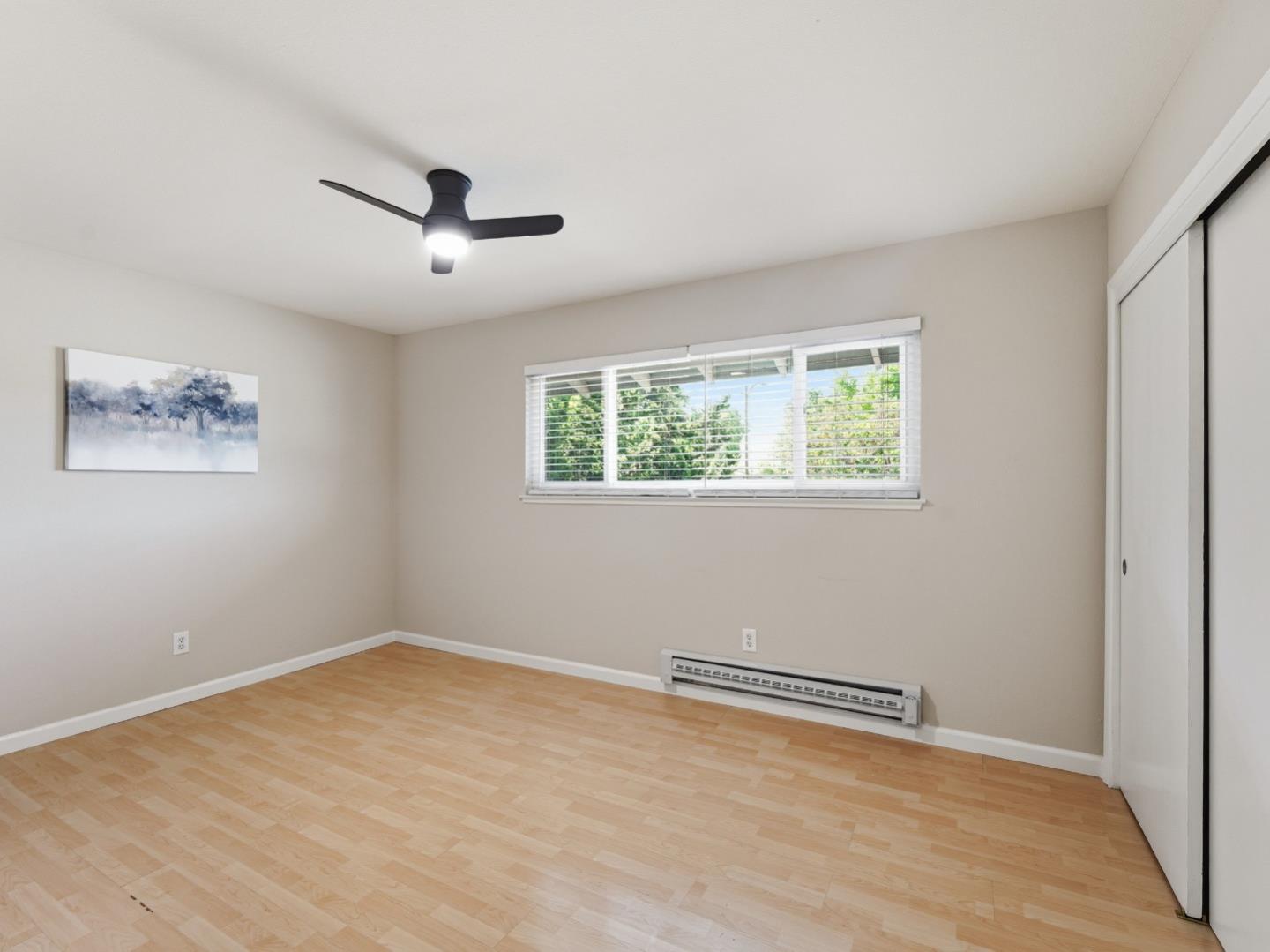 607 Valley Forge Way, Unit 4 Campbell, CA 95117 - Photo 7 of 12 a view of a room with wooden floor and window