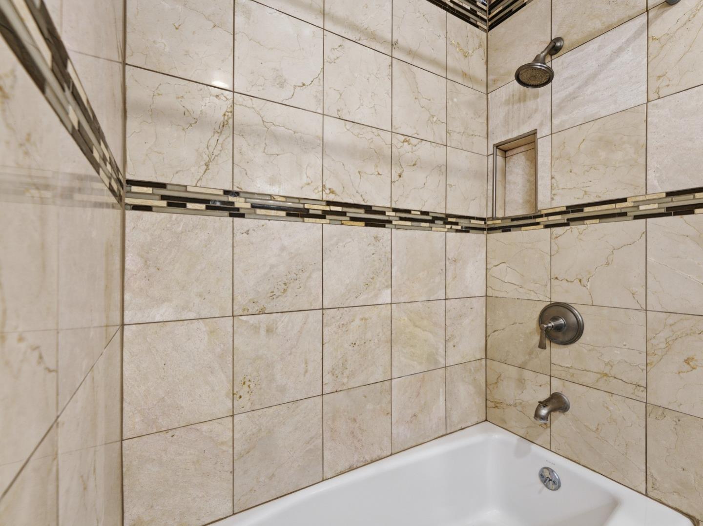 607 Valley Forge Way, Unit 4 Campbell, CA 95117 - Photo 10 of 12 a bathroom with a bathtub