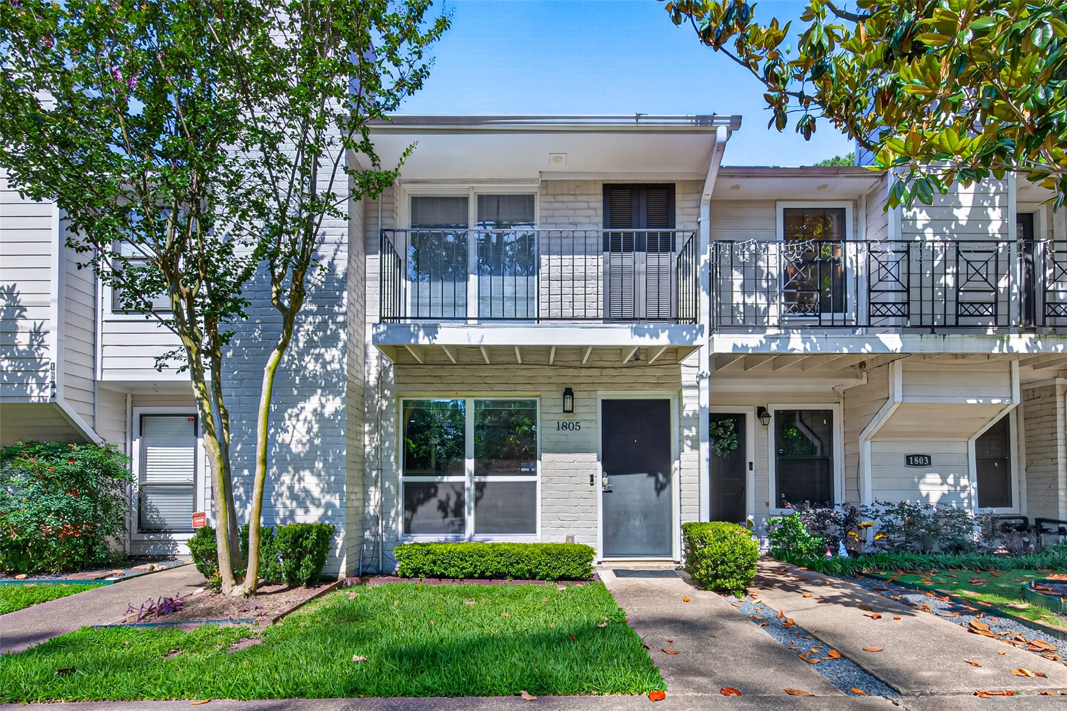 1805 Witte Road, Unit 3 Houston, TX 77080 - Photo 1 of 33 a front view of a house with garden and porch