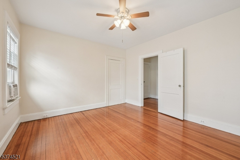 215 Speedwell Avenue, Unit 2 Morristown, NJ 07960 - Photo 12 of 13 a view of an empty room with wooden floor