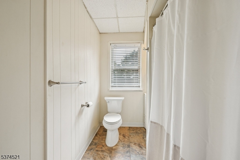 215 Speedwell Avenue, Unit 2 Morristown, NJ 07960 - Photo 9 of 13 a bathroom with a toilet and a shower