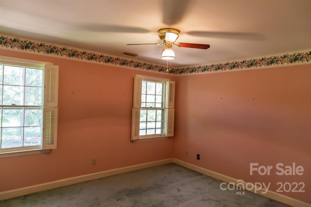 7300 Lancer Drive Charlotte, NC 28226 - Photo 23 of 48 a view of a room with window and chandelier