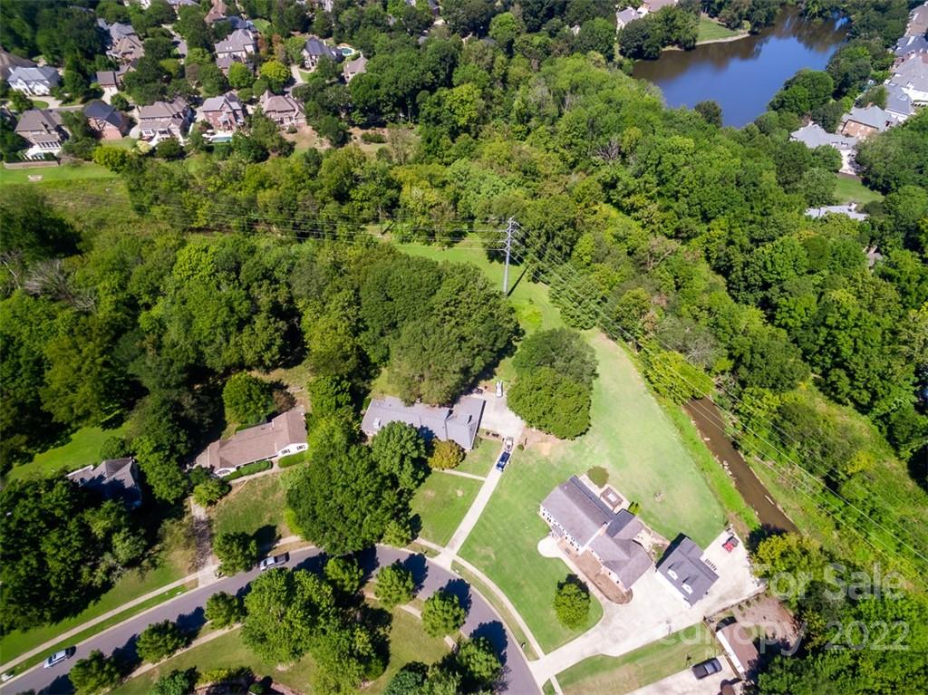 7300 Lancer Drive Charlotte, NC 28226 - Photo 3 of 48 an aerial view of residential house with outdoor space and swimming pool