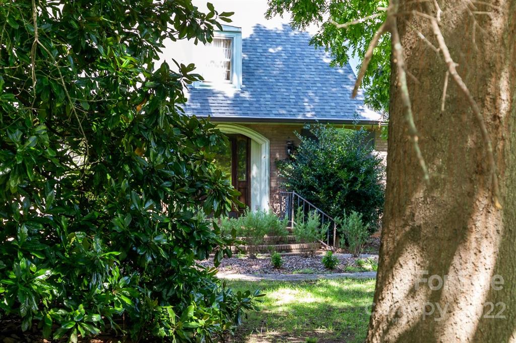 7300 Lancer Drive Charlotte, NC 28226 - Photo 41 of 48 a view of a house with a yard