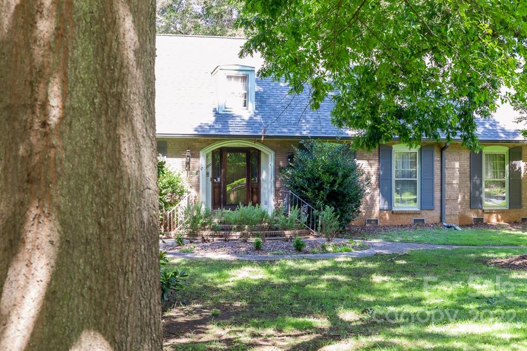 7300 Lancer Drive Charlotte, NC 28226 - Photo 42 of 48 a view of house with yard and outdoor space