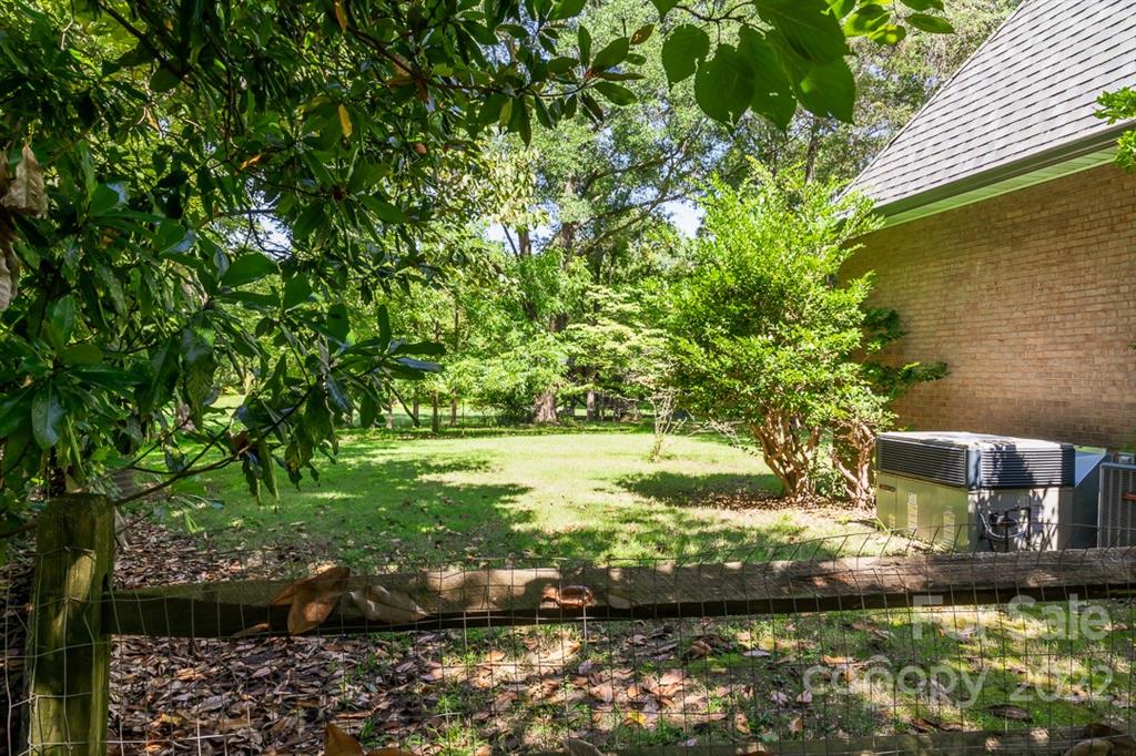 7300 Lancer Drive Charlotte, NC 28226 - Photo 43 of 48 a view of a garden with an outdoor space