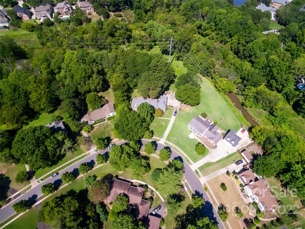 7300 Lancer Drive Charlotte, NC 28226 - Photo 5 of 48 an aerial view of a house with a yard