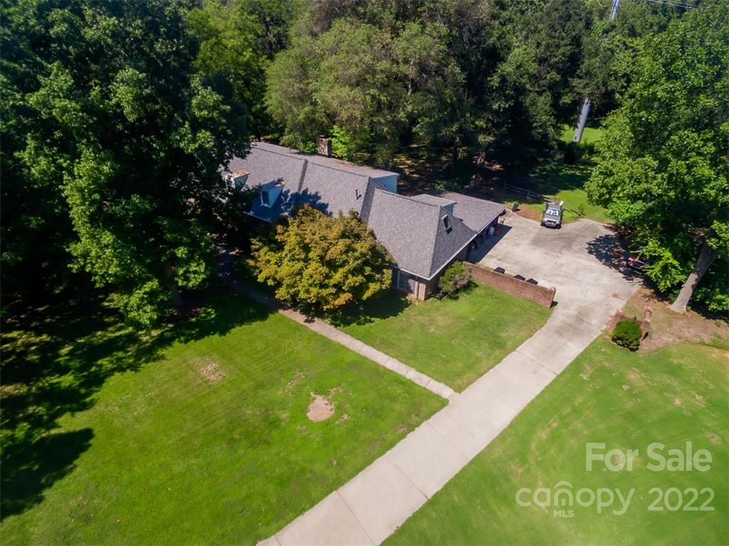 7300 Lancer Drive Charlotte, NC 28226 - Photo 10 of 48 a view of a golf course with plants