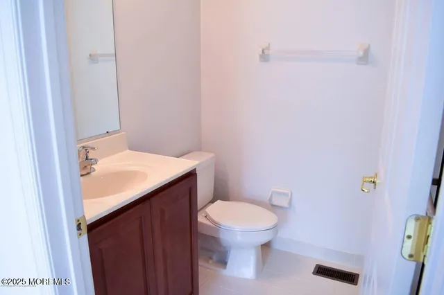 a bathroom with a sink and toilet
