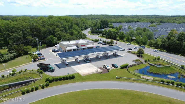 an aerial view of a house with a garden