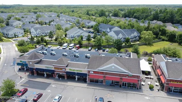 an aerial view of a city with lots of residential buildings