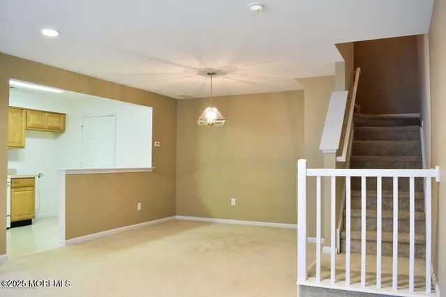 a view of hallway with stairs