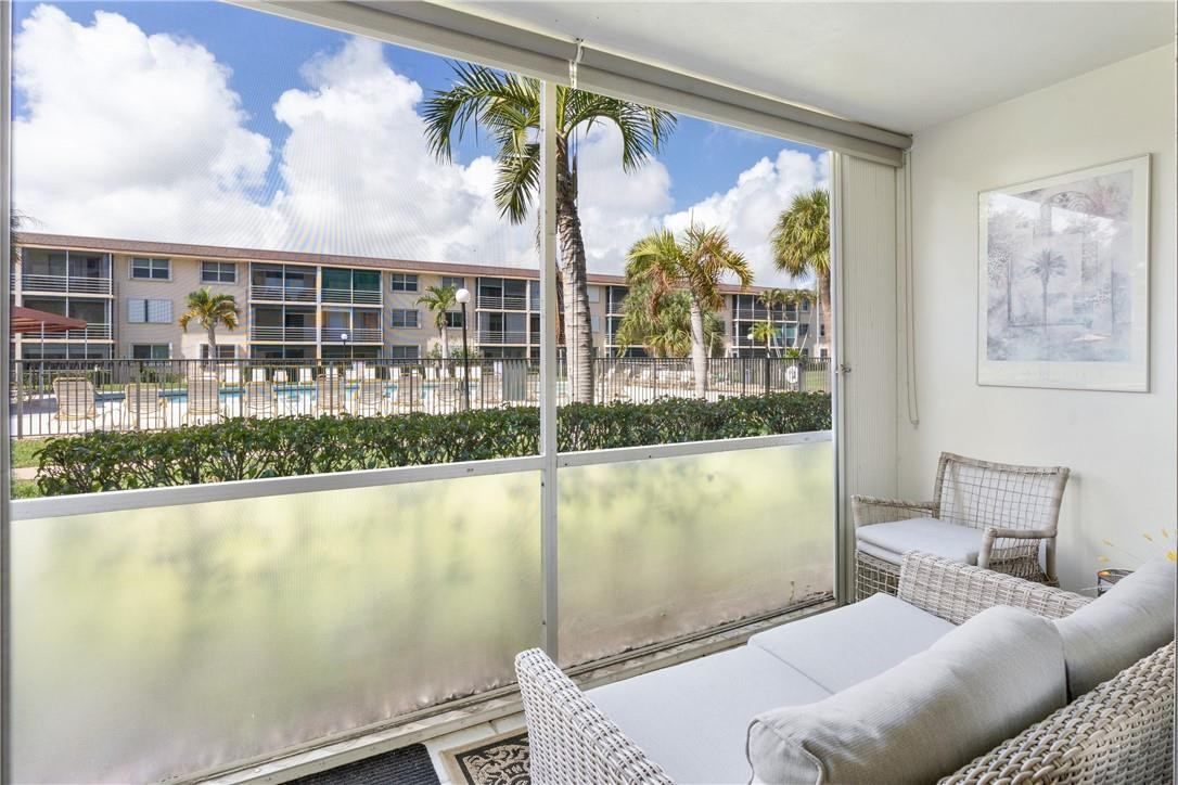 4500 North Federal Highway, Unit 150F Lighthouse Point, FL 33064 - Photo 16 of 18 a living room with furniture