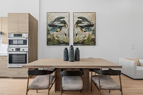 a view of a dining room with furniture