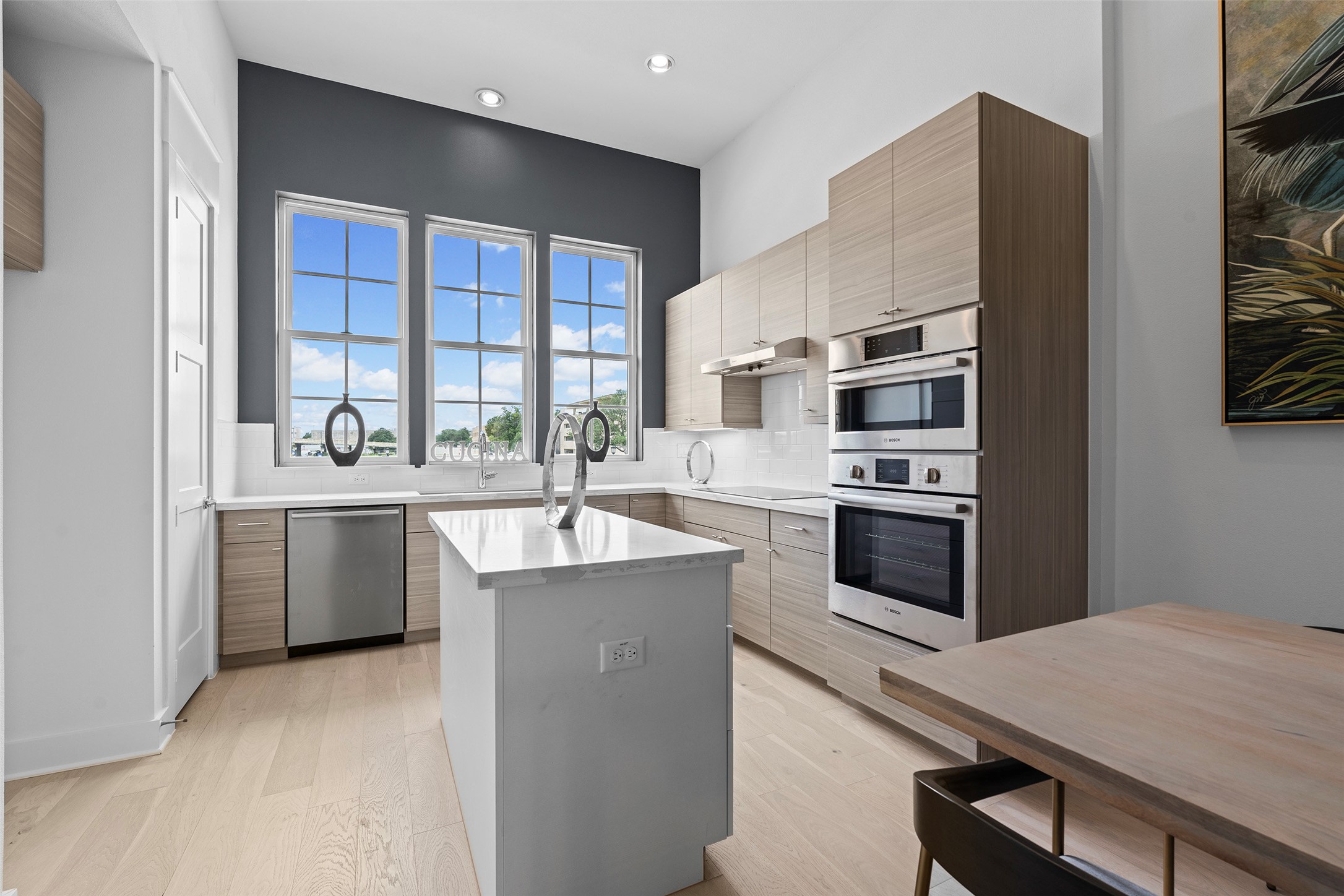 239 Watt Court Round Rock, TX 78664 - Photo 13 of 40 a kitchen with a sink stove and refrigerator