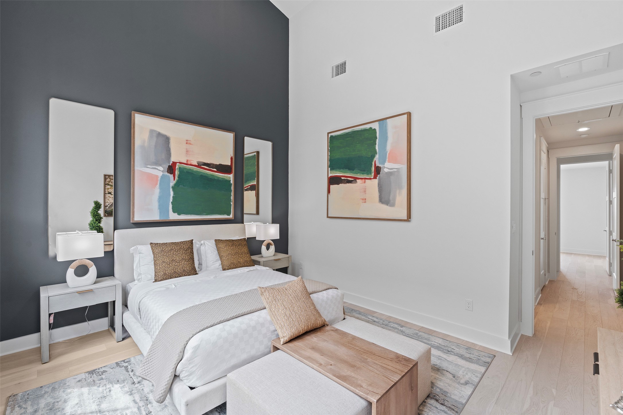 239 Watt Court Round Rock, TX 78664 - Photo 22 of 40 a bedroom with a bed and a flat screen tv