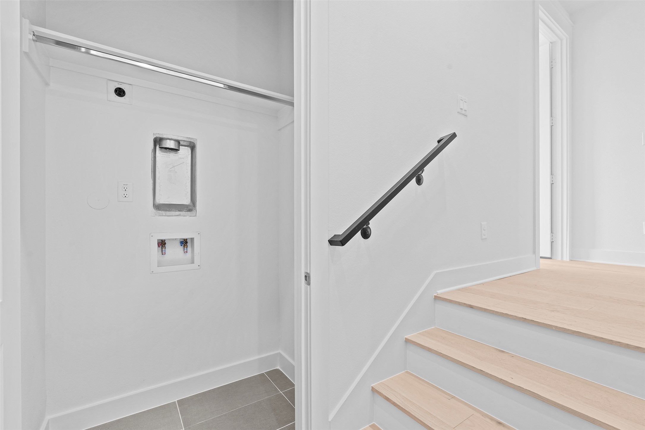 239 Watt Court Round Rock, TX 78664 - Photo 25 of 40 a view of staircase with white walls and railing