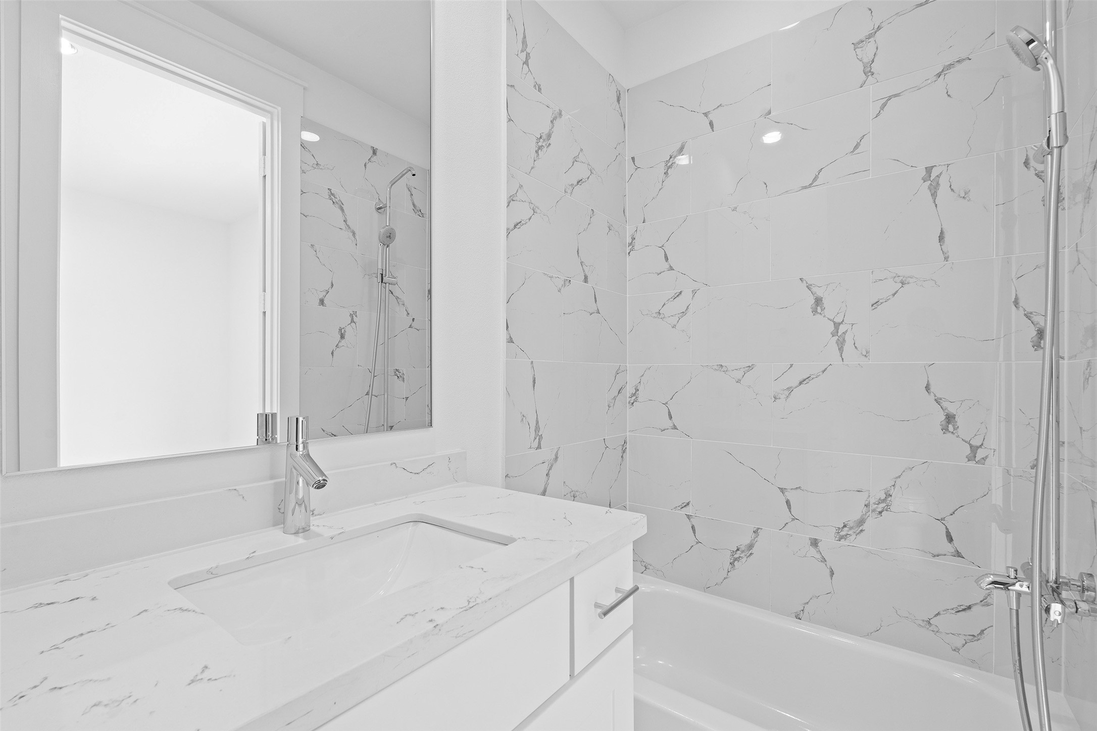 239 Watt Court Round Rock, TX 78664 - Photo 28 of 40 a bathroom with a sink and a bathtub