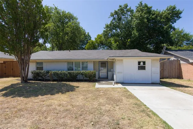 front view of a house with a patio