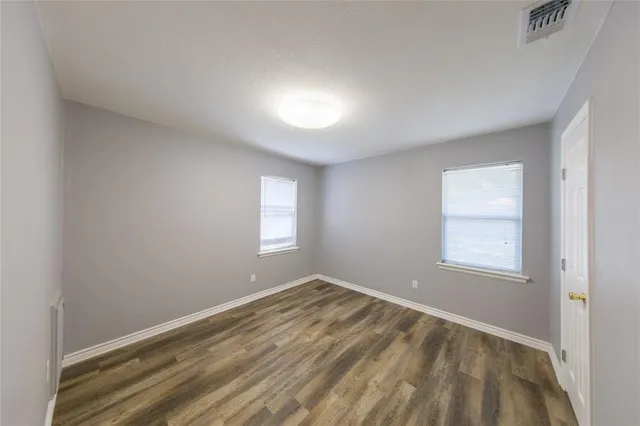 a view of a room that has a window in it