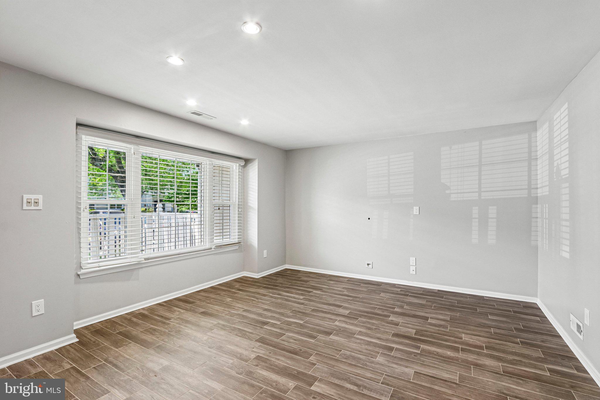 803 Wharton Road Mount Laurel, NJ 08054 - Photo 10 of 48 a view of empty room with wooden floor and fan