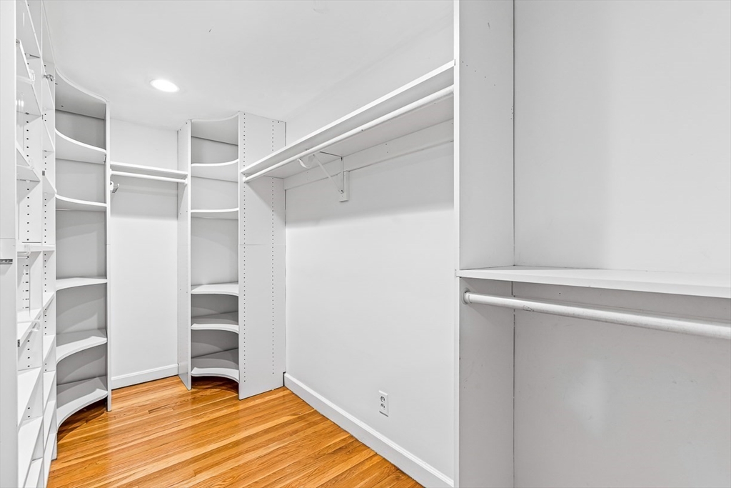 21 Madison Road Wellesley, MA 02481 - Photo 18 of 26 a view of walk in closet with empty racks