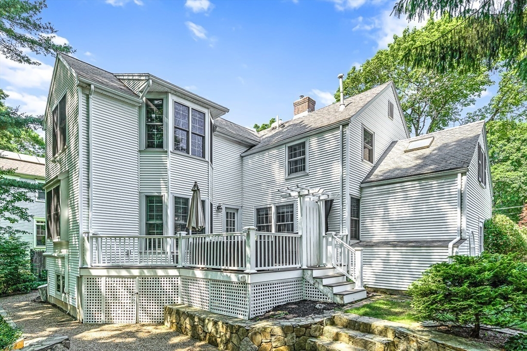 21 Madison Road Wellesley, MA 02481 - Photo 2 of 26 front view of a house with a street