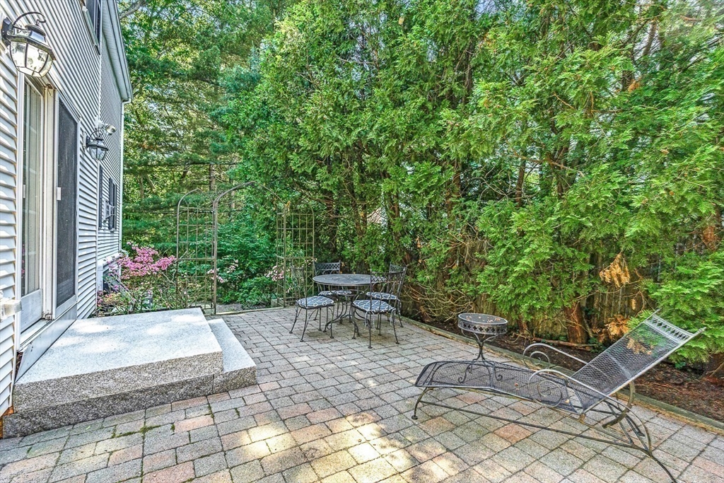 21 Madison Road Wellesley, MA 02481 - Photo 25 of 26 a view of a backyard with sitting area