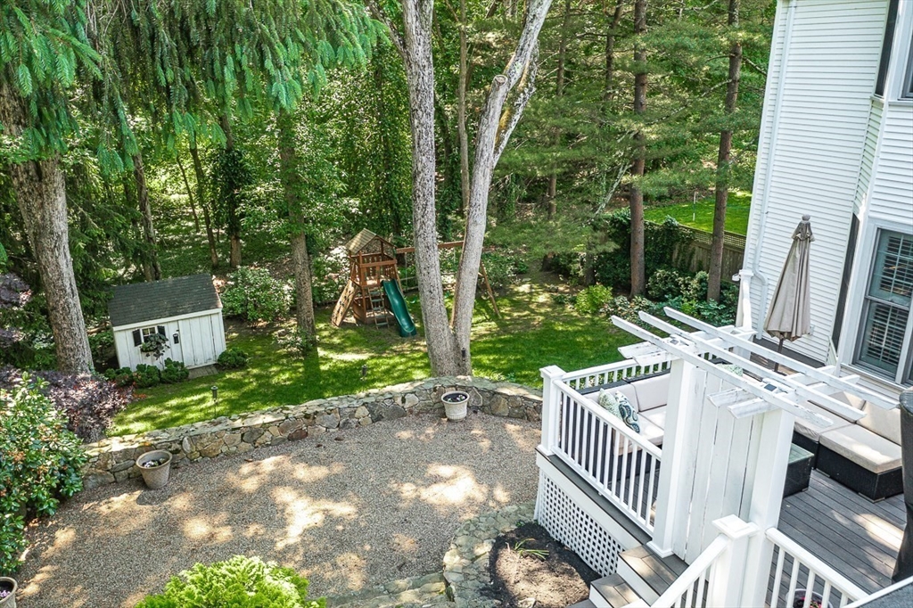 21 Madison Road Wellesley, MA 02481 - Photo 3 of 26 a view of a porch with a yard