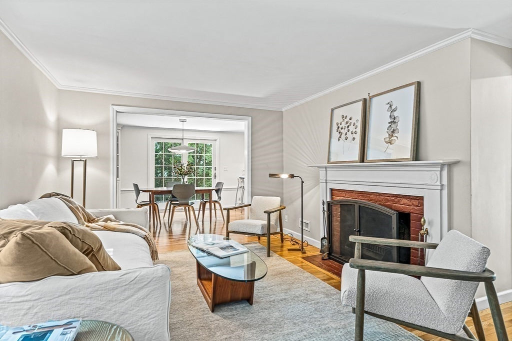 21 Madison Road Wellesley, MA 02481 - Photo 7 of 26 a living room with furniture and a fireplace