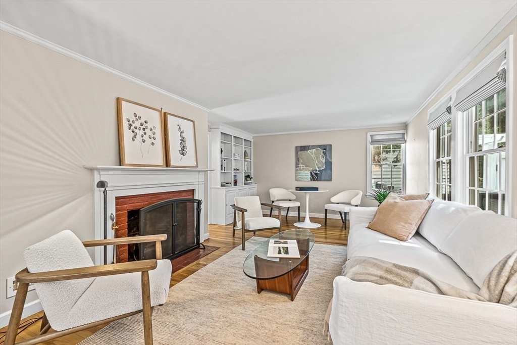 21 Madison Road Wellesley, MA 02481 - Photo 8 of 26 a living room with furniture and a fireplace