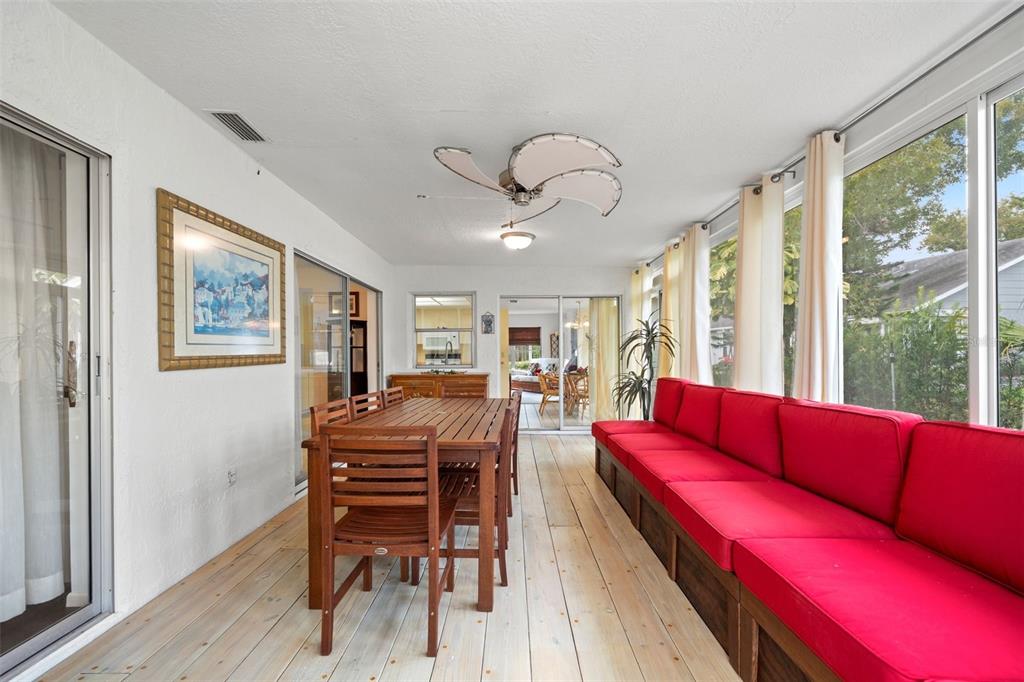 6404 Lost Tree Lane Spring Hill, FL 34606 - Photo 22 of 63 a view of a livingroom with furniture window and wooden floor