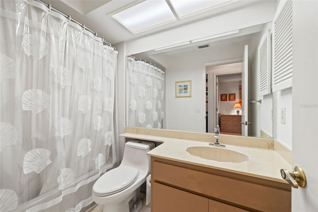 6404 Lost Tree Lane Spring Hill, FL 34606 - Photo 33 of 63 a bathroom with a sink toilet and shower