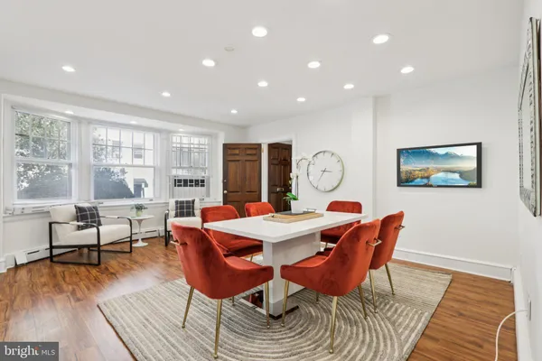 a room with furniture and a window