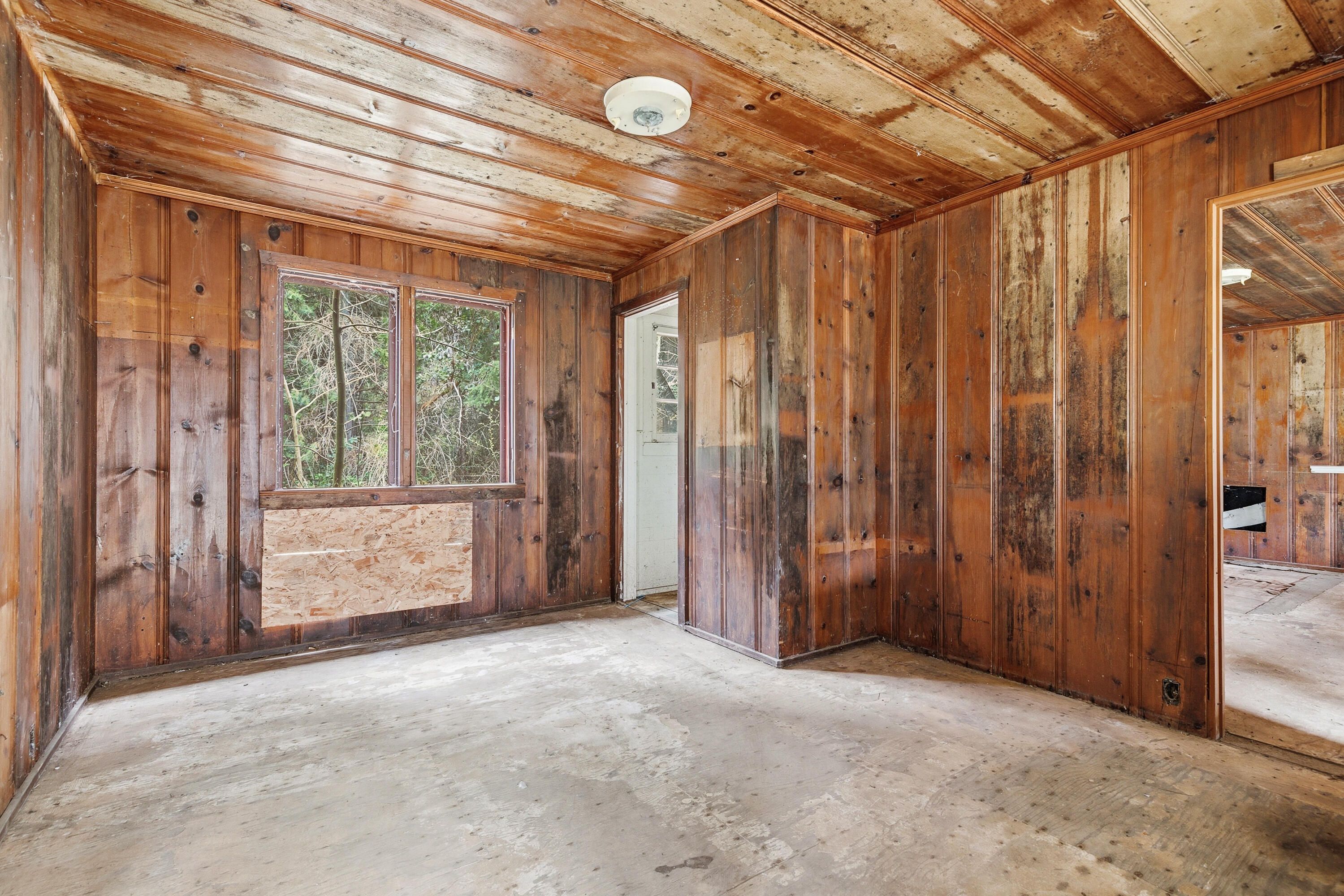 159 Bloom Road Wolf Creek, OR 97497 - Photo 19 of 38 a view of an empty room with a window