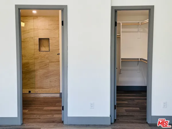 a view of an empty walk in closet