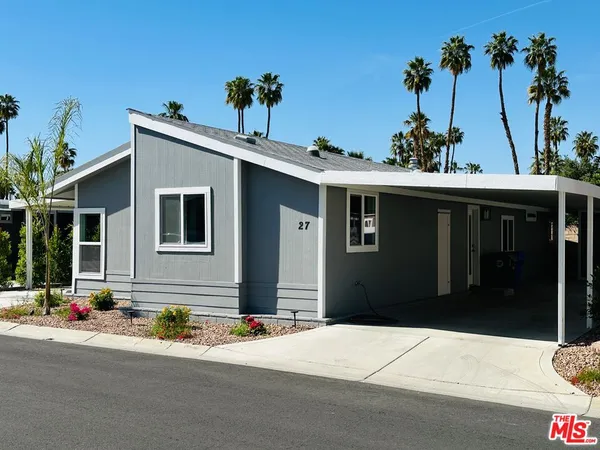 a front view of a house with a garage