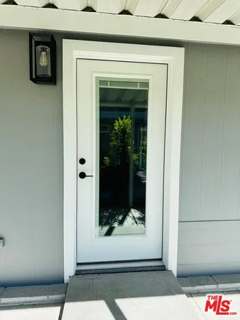 a view of a entryway door of the house