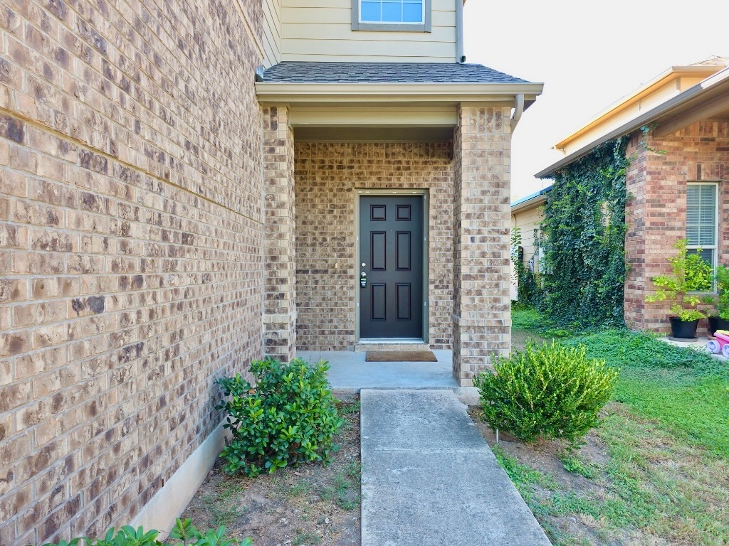 3805 Tranquil Lane Austin, TX 78728 - Photo 2 of 30 a front view of a house with garden