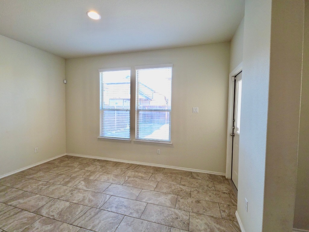 3805 Tranquil Lane Austin, TX 78728 - Photo 7 of 30 a view of an empty room and window