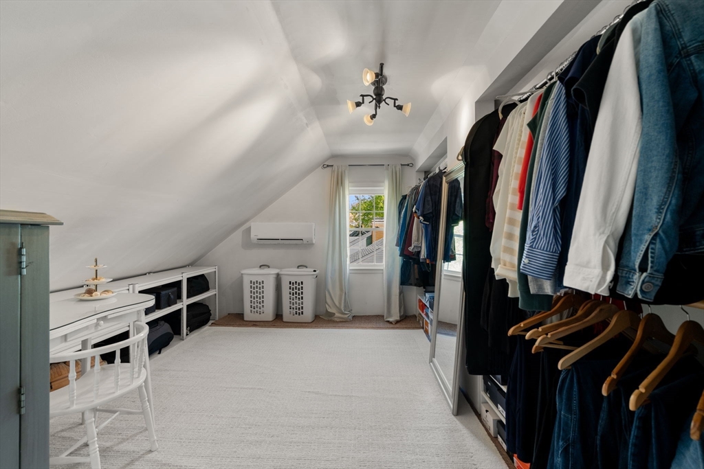 22 Crest Road Framingham, MA 01702 - Photo 23 of 38 a view of walk in closet with clothes and shoes