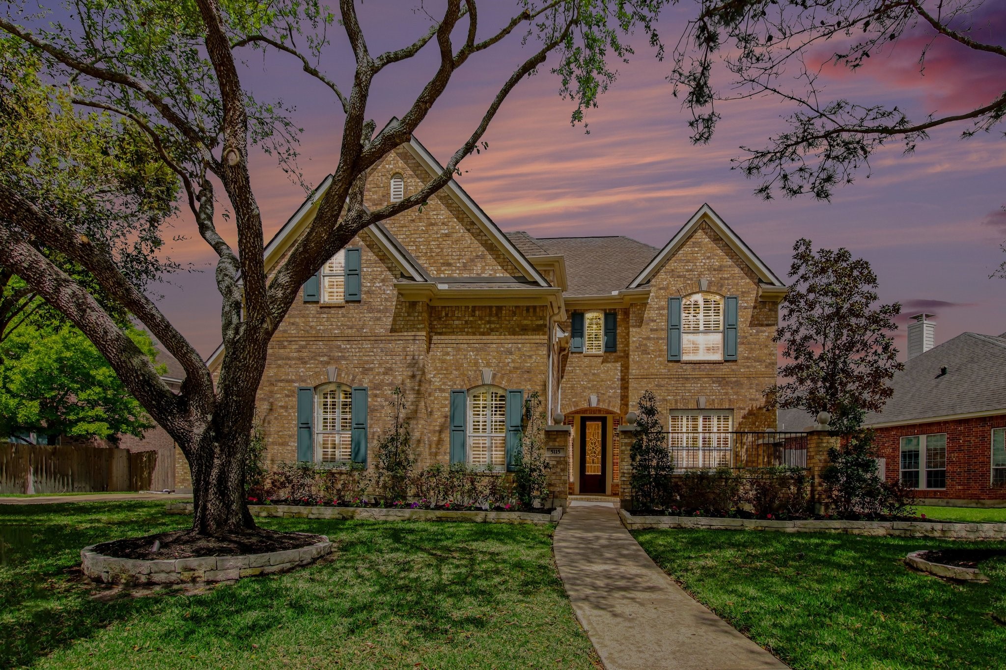 5115 Luke Ridge Lane Katy, TX 77494 - Photo 1 of 36 a front view of a house with a garden