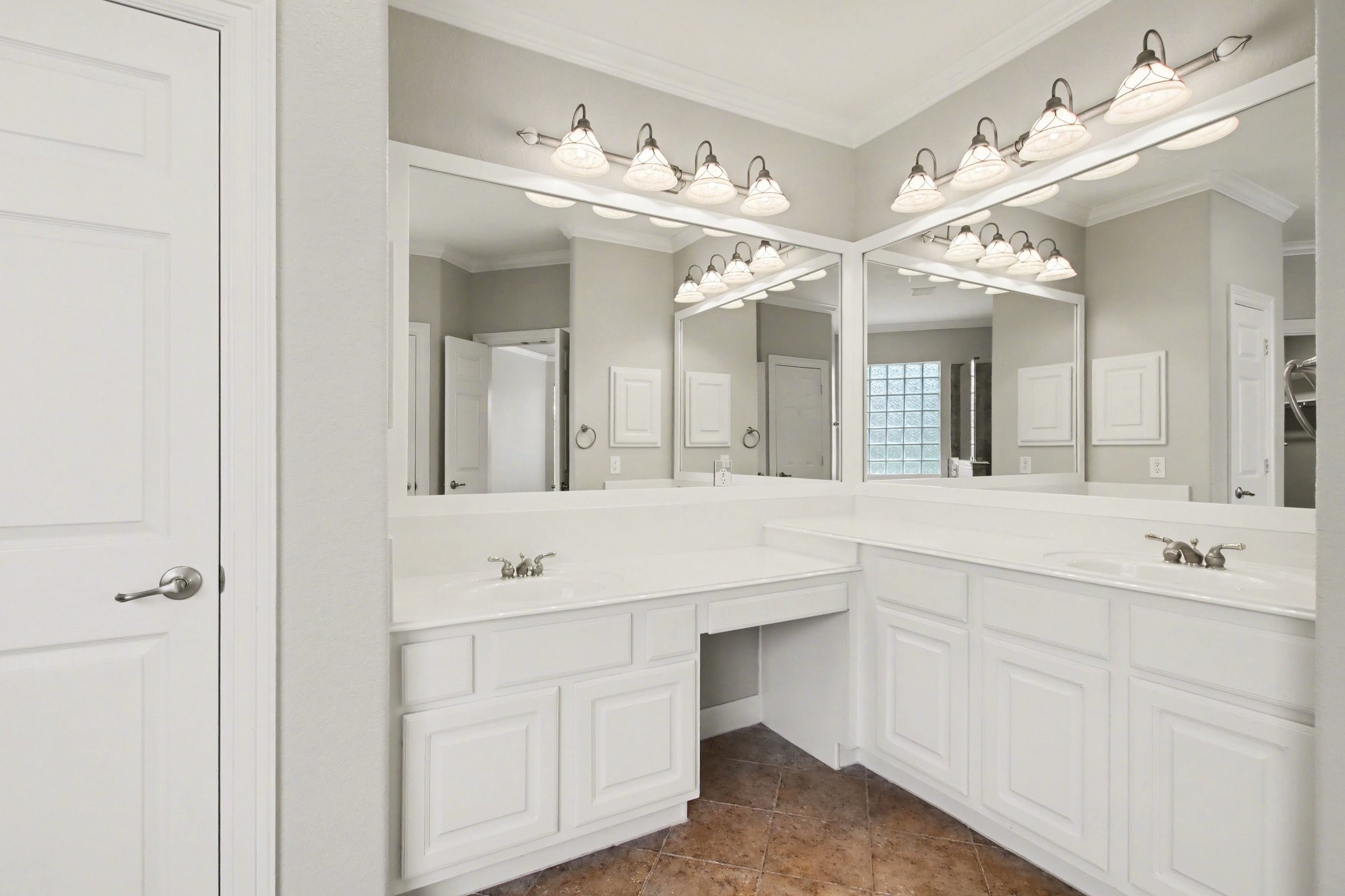 5115 Luke Ridge Lane Katy, TX 77494 - Photo 17 of 36 a spacious bathroom with a double vanity sink and a mirror