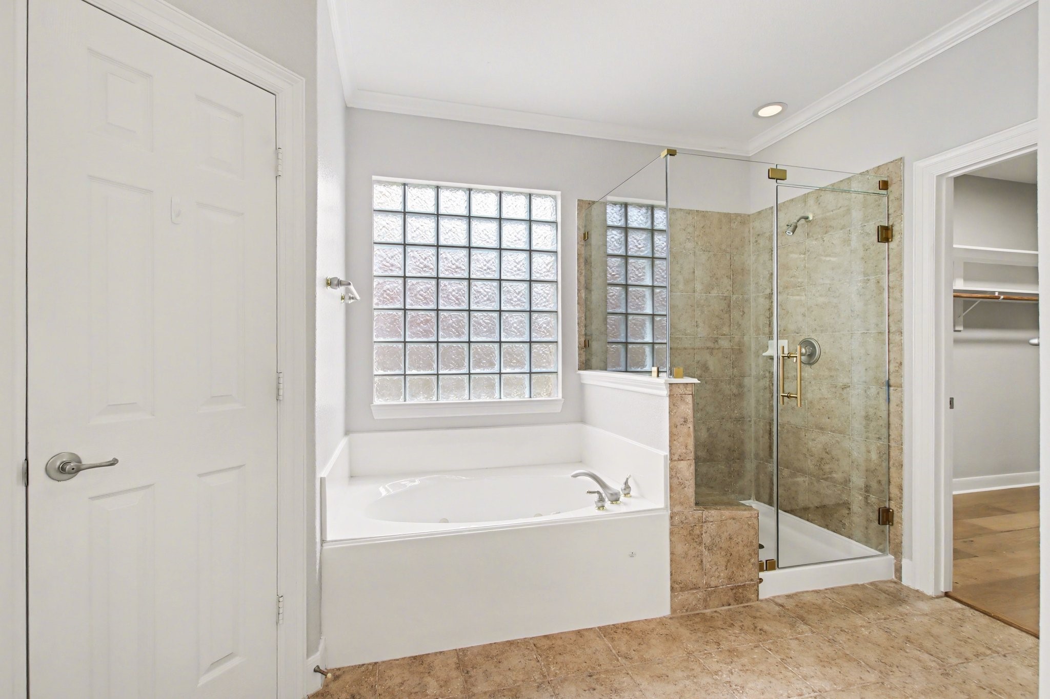 5115 Luke Ridge Lane Katy, TX 77494 - Photo 18 of 36 a bathroom with a bathtub and a shower