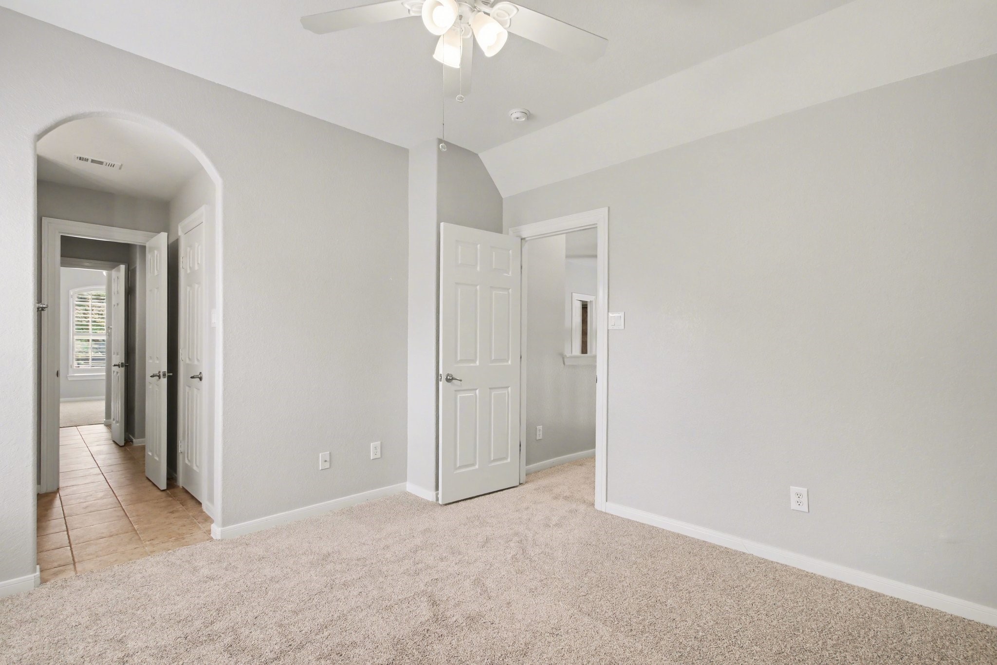 5115 Luke Ridge Lane Katy, TX 77494 - Photo 22 of 36 a view of a room with a chandelier fan