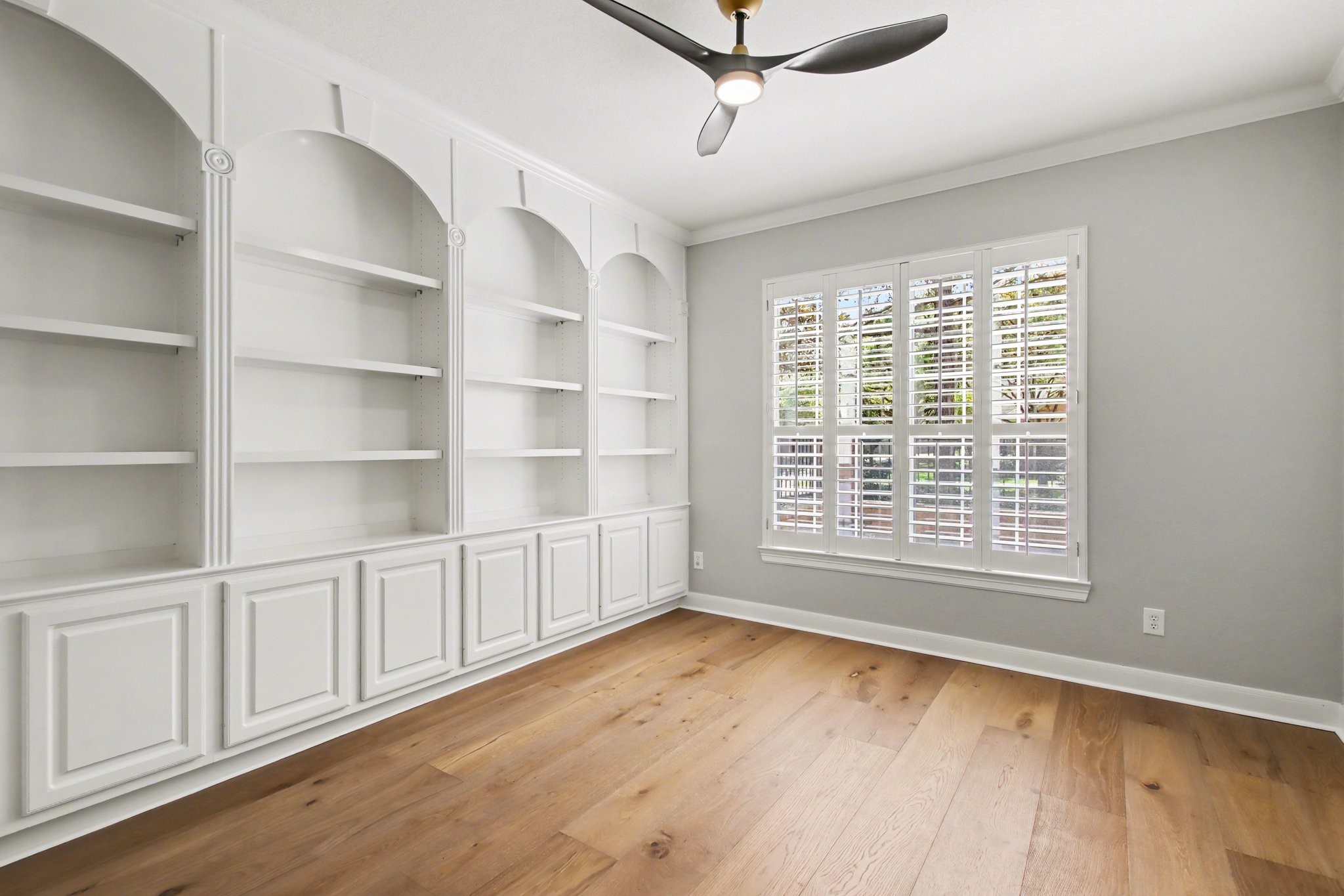 5115 Luke Ridge Lane Katy, TX 77494 - Photo 28 of 36 a view of an empty room with a window and wooden floor