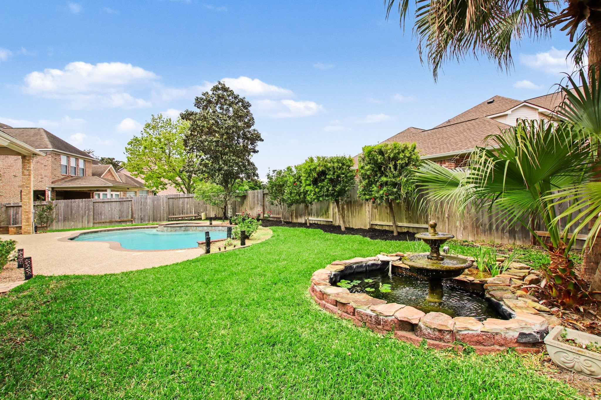 5115 Luke Ridge Lane Katy, TX 77494 - Photo 31 of 36 a view of a backyard with swimming pool