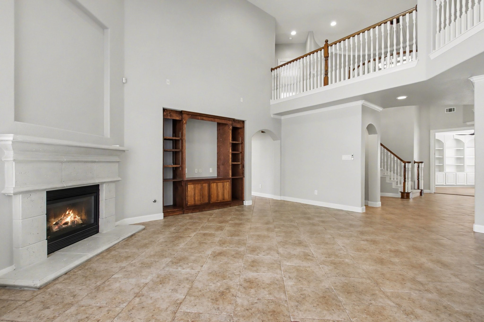 5115 Luke Ridge Lane Katy, TX 77494 - Photo 7 of 36 a view of an empty room with fireplace and a window