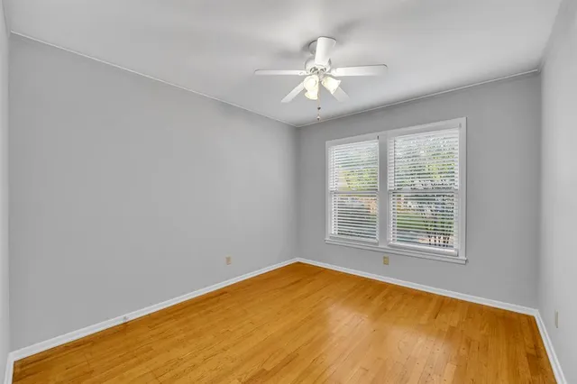 a view of a room with a large window